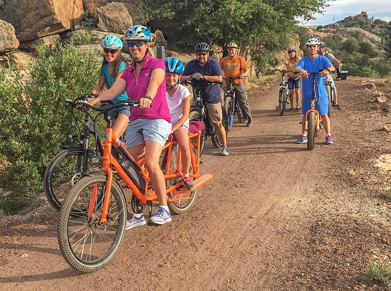Group of Ebike Riders Posing for Photo on Trail