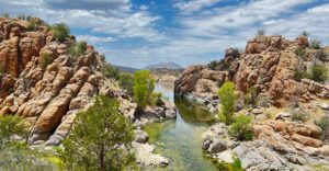 Scenic View of Lake Surrounded by Unique Granite Rock Formations